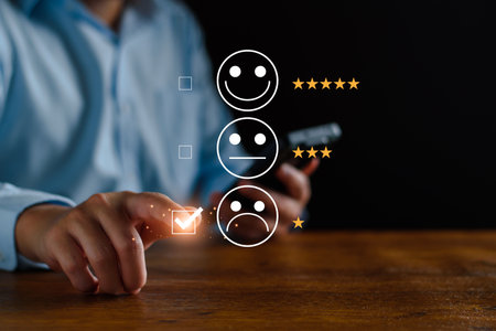 Bad service concept. Customer rating low satisfaction, unhappy customer, poor service, dissatisfied product, substandard product, negative face icon. Online satisfaction survey via virtual screen.の写真素材