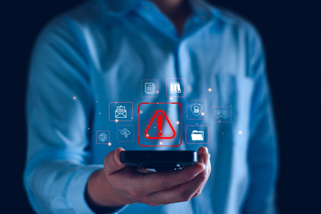 System warning hacked alert, cyber attack on computer network. programmer, Businessman staff, developer using technology with triangle caution warning sign notification error and maintenance concept.の写真素材