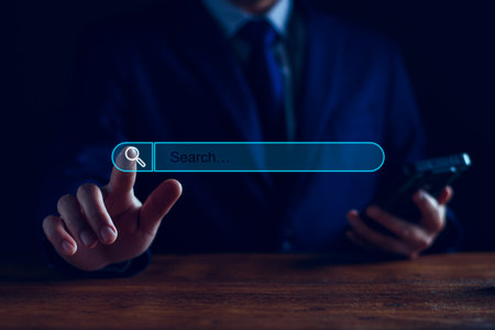 Data Search Technology Engine Optimization. Businessman hand touch searching icon for information on internet network, search jobs, apply online jobs, manage data bases, Research business information.の写真素材