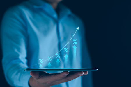 Interest rate and dividend concept. Businessman with percentage symbol and up arrow, Interest rates continue to increase, return on stocks and mutual funds, long term investment for retirement.の写真素材