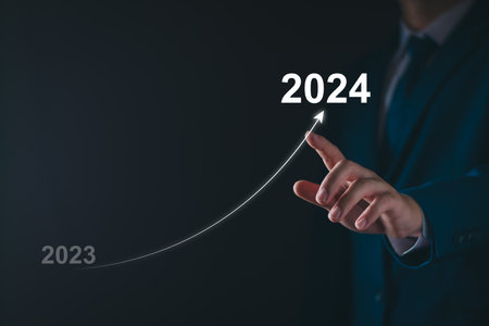 2024 new year goal concept. Hand touch goal icon, target 2023 to 2024 for preparation happy new year, start new year. Planning, opportunity, challenge, business strategy. New goal for Next Year 2024.の写真素材