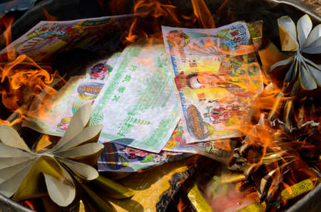 Burning "Ghost money" paper on Chinese New Year February 7, 2016の写真素材