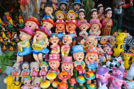 Angsila, Thailand - April 4, 2016 : Colorful Clay doll Shop in Angsila cityのeditorial素材