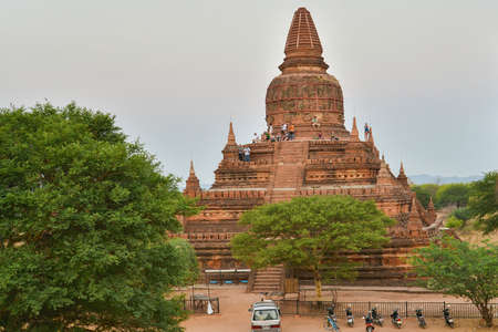 Bagan, Myanmar - April 22, 2016 : Group Of People Looking at Sunrise from Bulethi pagoda