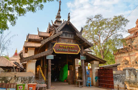 Bagan, Myanmar - April 22, 2016 : The old wooden gate of Ananda temple,  This temple built in 1105 AD during the reign of King Kyanzitthaのeditorial素材