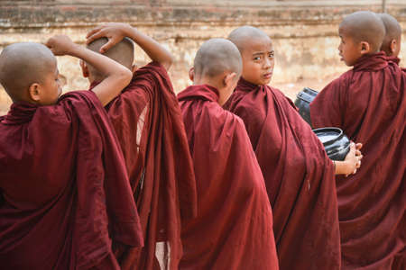 Bagan, Myanmar - April 22, 2016 : Little Buddhist  monks looking at cameraのeditorial素材