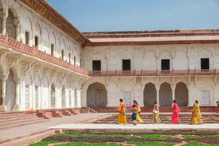 Agra, India - April 30, 2017 : Indian people walking by Khas Mahal and facing garden, Agra Fort, Agra, Indiaのeditorial素材