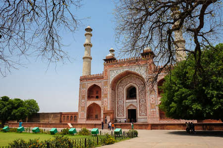 The entrance of the Sikandra monument or Akbar tomb in Agra, where Akbar the Great is buried. A World heritage site. A red sandstone architecture gate with intricate mughal carvings.のeditorial素材