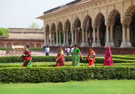 Agra, India - April 30, 2017 : Indian people walking by Khas Mahal and facing garden, Agra Fort, Agra, Indiaのeditorial素材