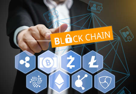 Concept of Business man points his finger at Blockchain, Cryptocurrency 