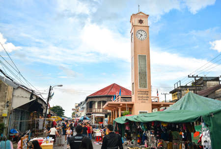 Nakhon Phanom, Thailand - Aug 11, 2018:  Nakhon Phanom Walking  Street market in front of Clock...