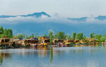 Srinagar,  India - April 25, 2017 : Lifestyle in Dal lake, People living in 'House boat' and using  small boat 'Shikara' for transportationのeditorial素材