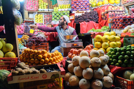 Srinagar,  India - April 22, 2017 : A man selling his goods in Srinagar marker next to Dal lakeのeditorial素材