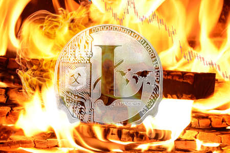 litecoin buring in Bonfire, Cryptocurrency Price Value Going down, concept photo.の写真素材