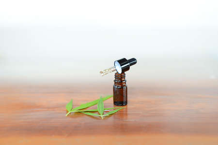 CBD Oil glass bottle with Marijuana leaves, Cannabis liquid for medicalの写真素材