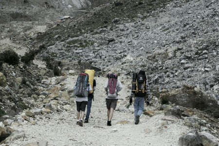 people hiking to the snow mountainの素材