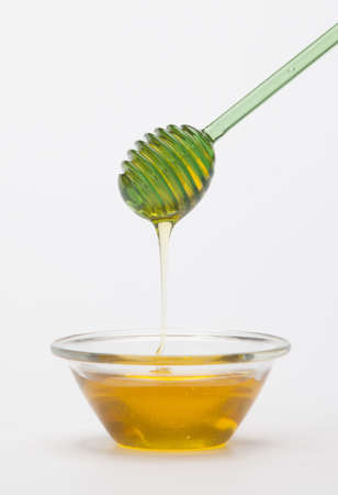 Full honey pot and honey special stickの写真素材