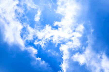 BLUE SKY WITH WHITE CLOUDSの写真素材