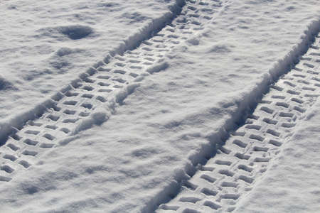 ATV Tracks in the Snowの写真素材
