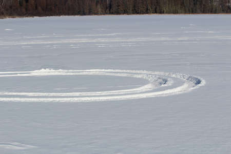 ATV Tracks in the Snowの写真素材