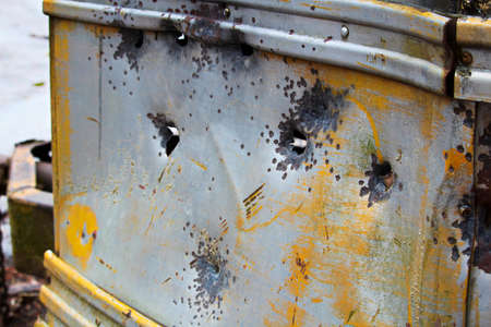 Stripped abandoned bus at a hunters camp on crown land.の写真素材