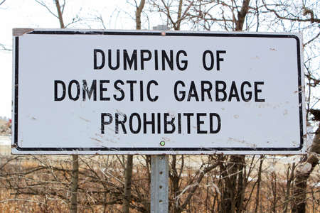 Dumping of domestic garbage prohibited sign.の写真素材