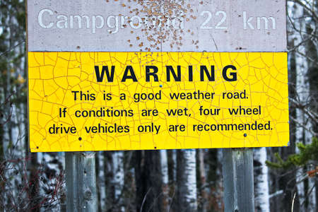 Warning about a rough road to campsite.の写真素材