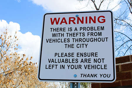 Warning sign about theft in the area.