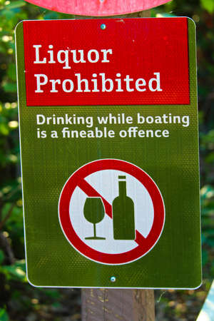 A liquor prohibited, drinking while boating is an offense sign.の写真素材