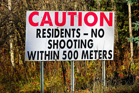 A Cautions Residents, No Shooting Within 500 Meters signの写真素材
