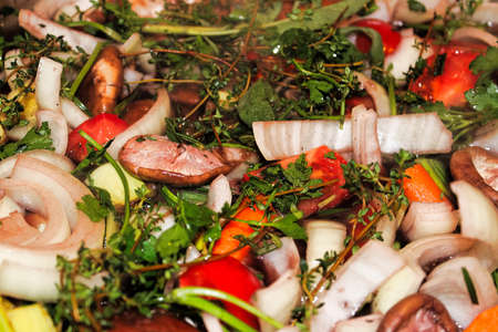 A background of various vegetables herbs and mushrooms.の写真素材