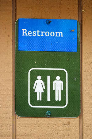Closeup of a male and female restroom sign.の写真素材
