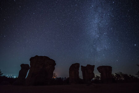 Milky Way rises over stone at Mor hin khao,Thailandの写真素材