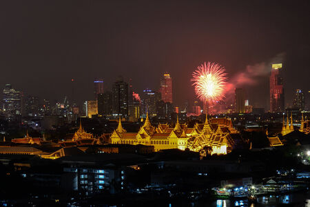 Grand Palace of Thailand at twilight with fireworksの写真素材