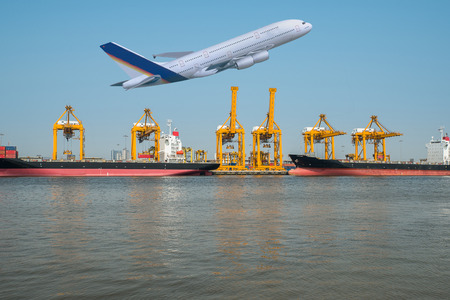 The cargo ship and plane on transport backgroundの写真素材