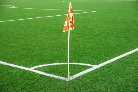 A flag at one corner of  football stadiumの写真素材