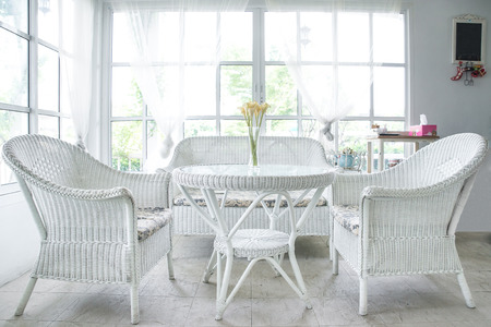 White chair and table and window sill in backgroundのeditorial素材