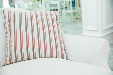 Pillow on white sofa in living room ,Vintage stlyeの写真素材