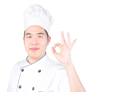 Portrait of an experienced chef making "OK" sign with clipping pathの写真素材