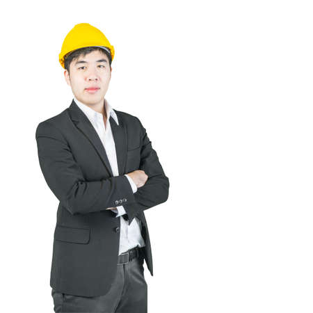 Asian engineer with drawings standing isolated on white background clipping pathの写真素材
