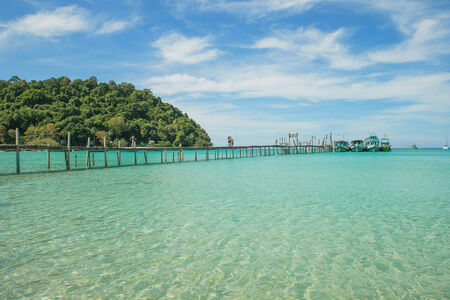 Wood bridge pier on sea with blue sky. Travel in Phuket Thailand.の素材 [FY31035347373]