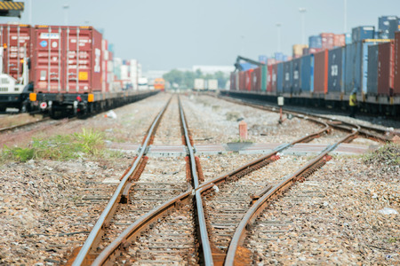 Cargo train platform with freight train container at depotの写真素材