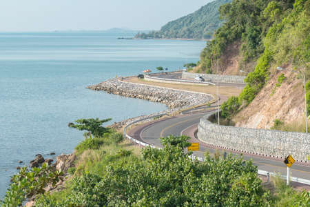 Landscape view of sea and curve road in Chantaburi, Thailandの写真素材