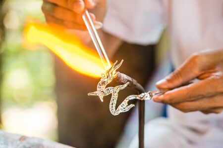 ing glass in a dragon shapeの写真素材