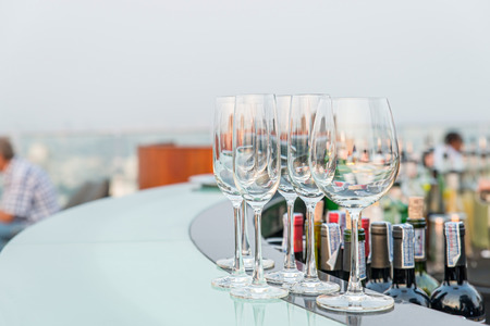 Many empty glass on counter at rooftop barの写真素材