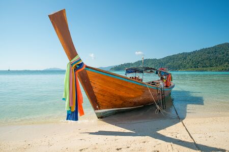 Summer, Travel, Vacation and Holiday concept - Tropical beach, longtail boats at Lipe island in Satun, Thailandの写真素材