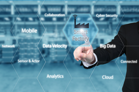 Business man touching smart factory icon in virtual interface screen showing data of smart factory. Business industry 4.0 concept. Business man touching smart factory icon in virtual interface screen showing data of smart factory. Business industry 4.0 concept.
