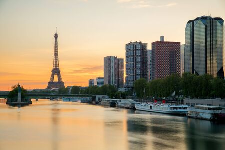 Eiffel tower and Paris skyline with skyscraper along Seine river in Paris, France. Eiffel tower at morning in Paris, France.のeditorial素材