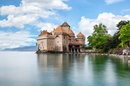 Beautiful view of famous Chateau de Chillon at Lake Geneva, one of Switzerland's major tourist attractions and most visited castles in Europe, Canton of Montreux, Switzerlandのeditorial素材
