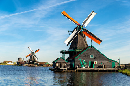 Traditional Dutch old wooden windmill in Zaanse Schans, Netherlands. Museum village in Zaandam, Netherlands.のeditorial素材
